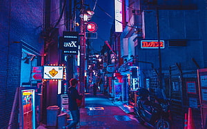 Neon-Lit Tokyo Alleyway at Night with Vibrant Japanese Signage and Cyberpunk Atmosphere HD wallpaper