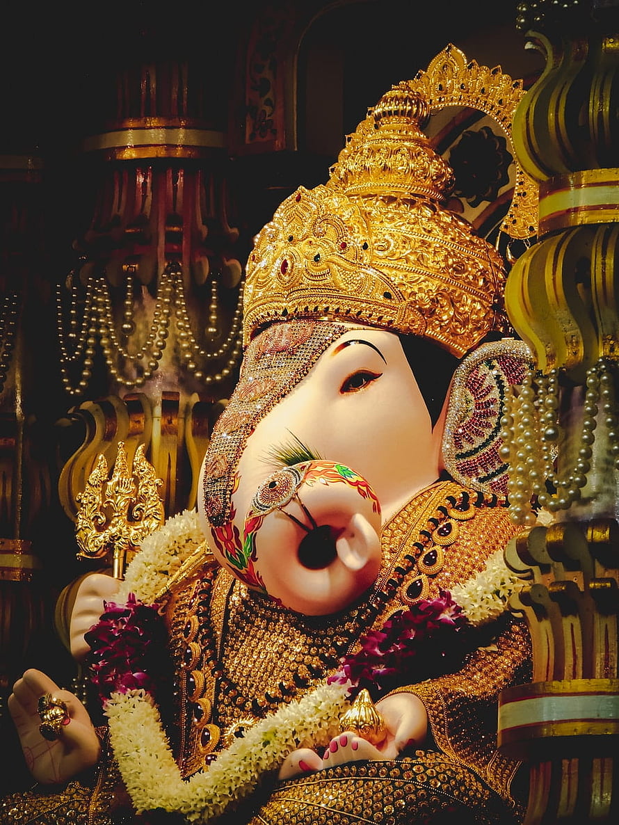 Dagdusheth Ganpati Murti in Ornate Gold Crown and Temple Garlands HD phone wallpaper