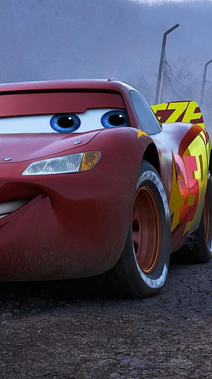 Lightning McQueen from Cars 3 in a gritty close-up with blue eyes and racing livery HD phone wallpaper