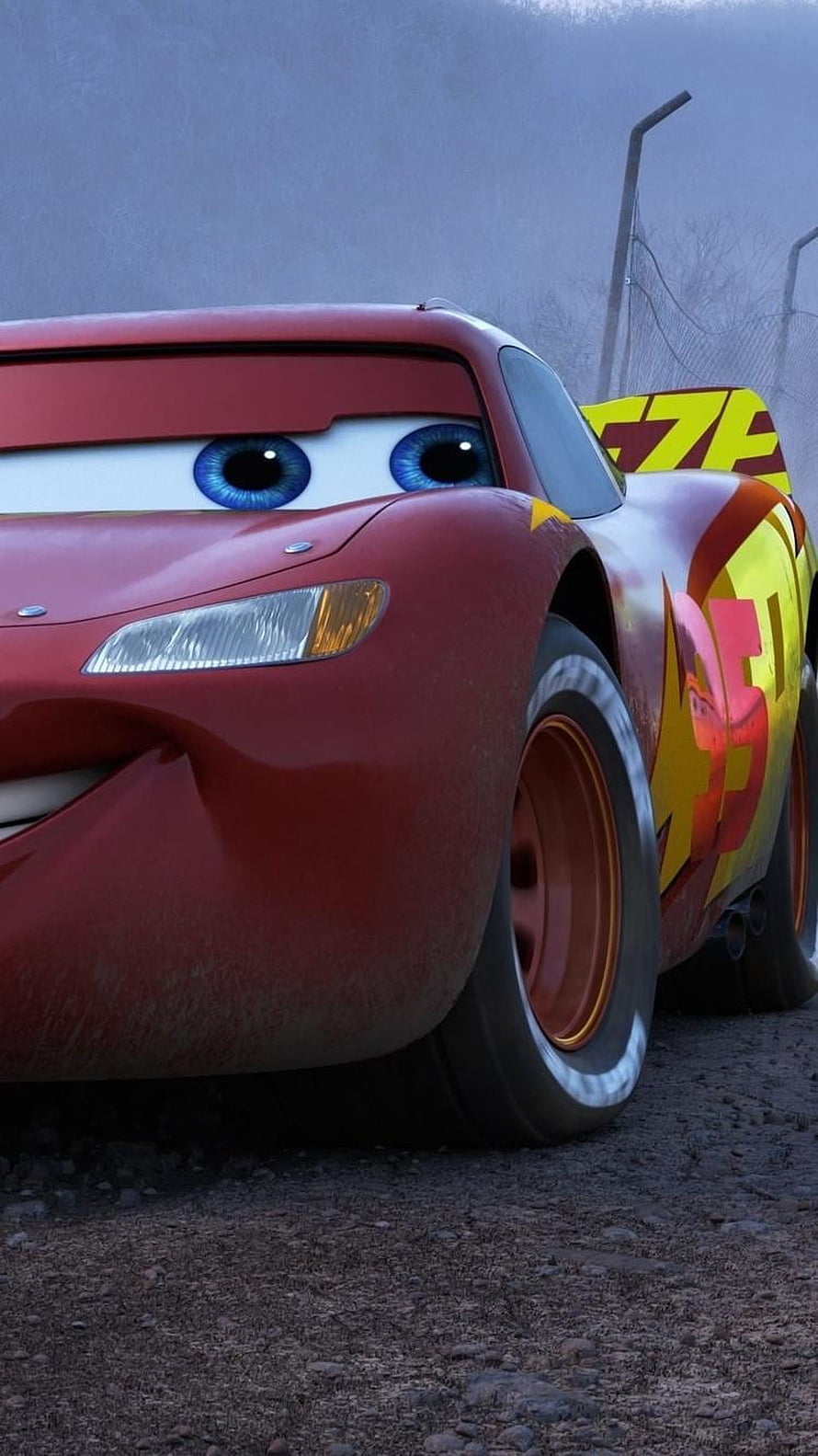 Lightning McQueen from Cars 3 in a gritty close-up with blue eyes and racing livery HD phone wallpaper