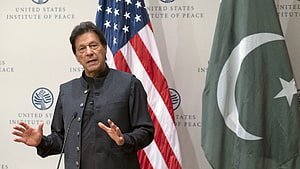 Imran Khan Addressing Audience at United States Institute of Peace with US and Pakistan Flags HD wallpaper