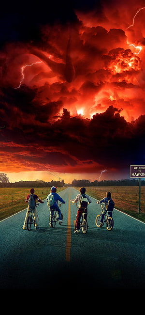 Stranger Things Kids on Bikes Under Dramatic Red Storm Sky HD phone wallpaper