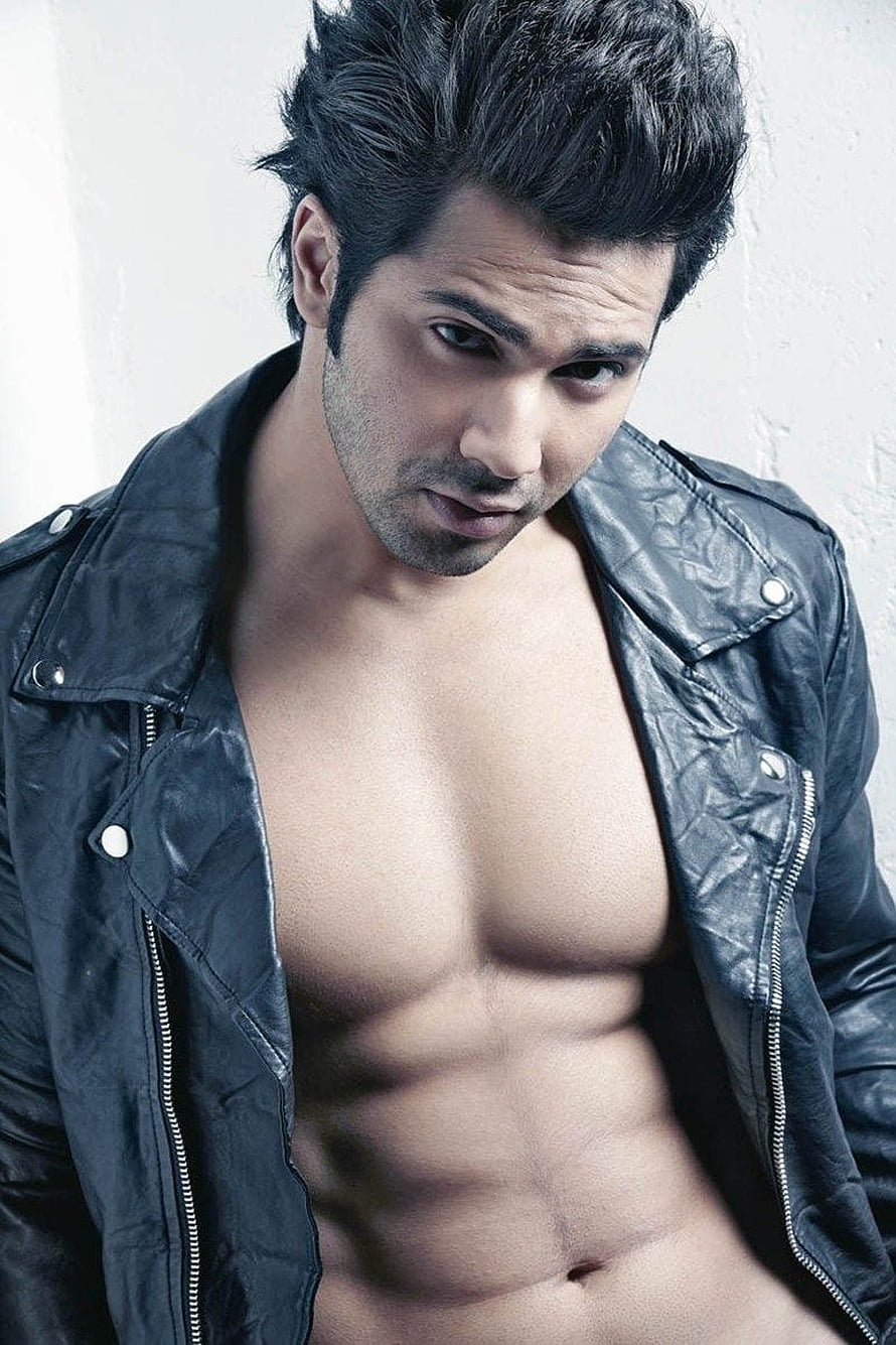 Varun Dhawan in Black Leather Jacket with Exposed Torso and Styled Hair HD phone wallpaper