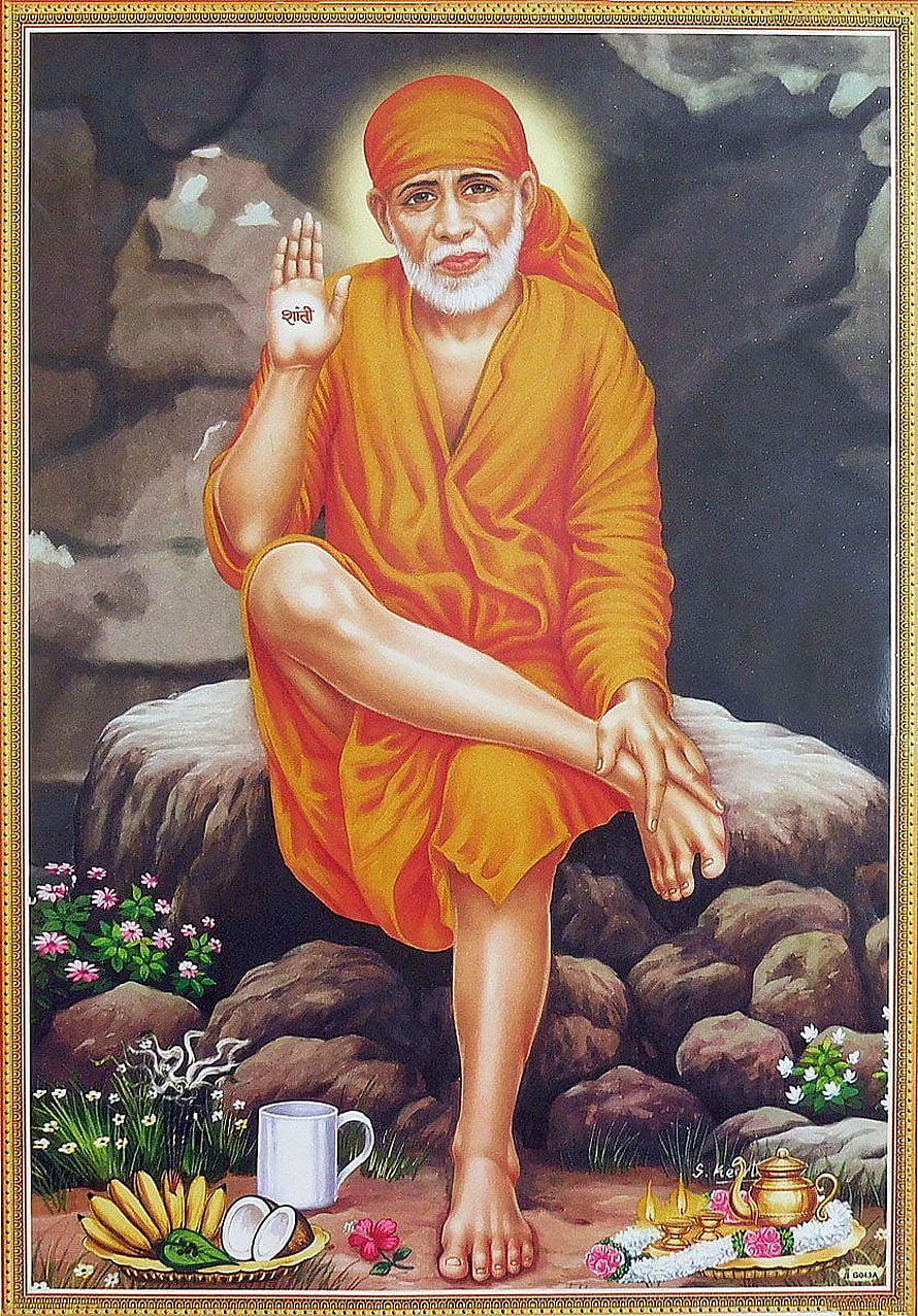 Sai Baba Portrait in Orange Robes Seated on Rock with Offerings and Flowers HD phone wallpaper