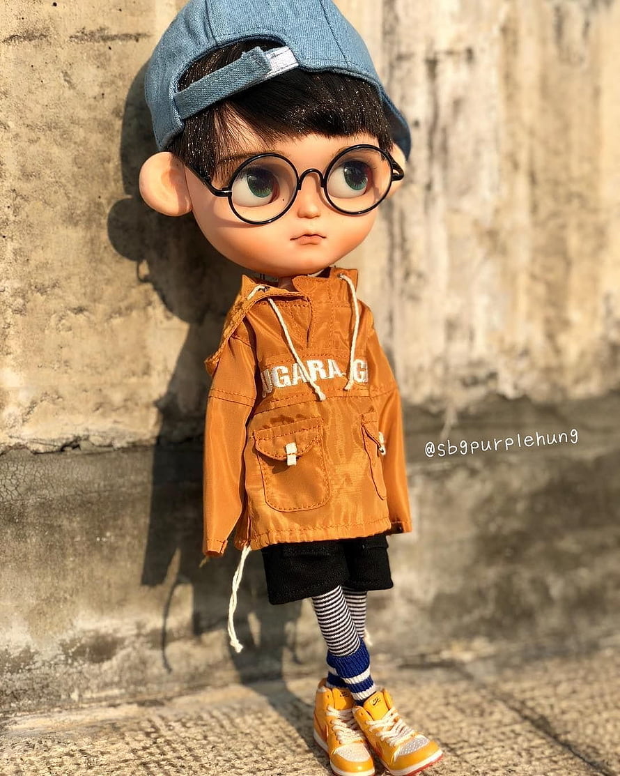 Stylish BJD Boy Doll in Orange Jacket, Round Glasses, and Denim Cap HD phone wallpaper