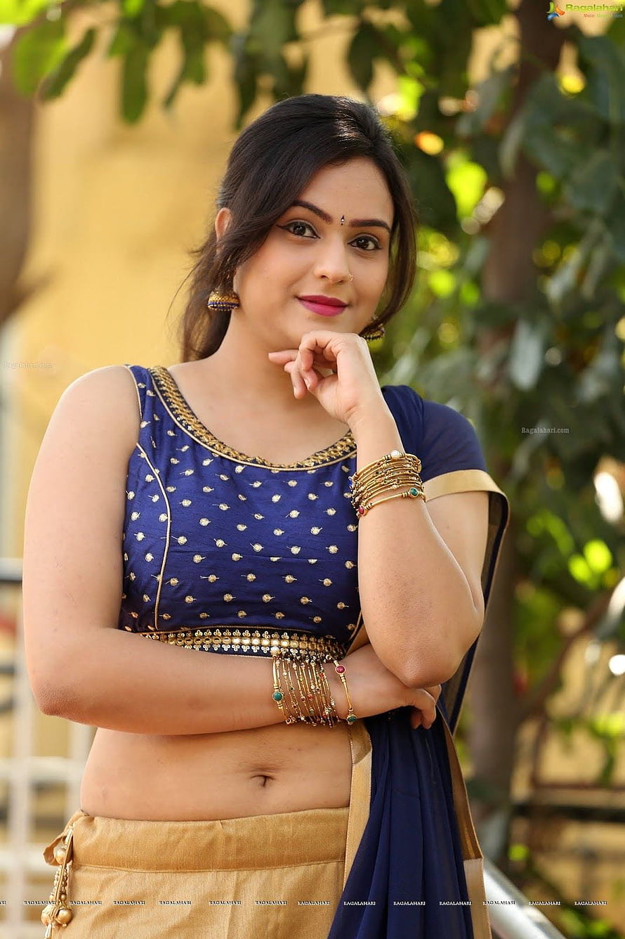 Priyansha Dubey in a blue and gold lehenga choli with traditional jewelry HD phone wallpaper