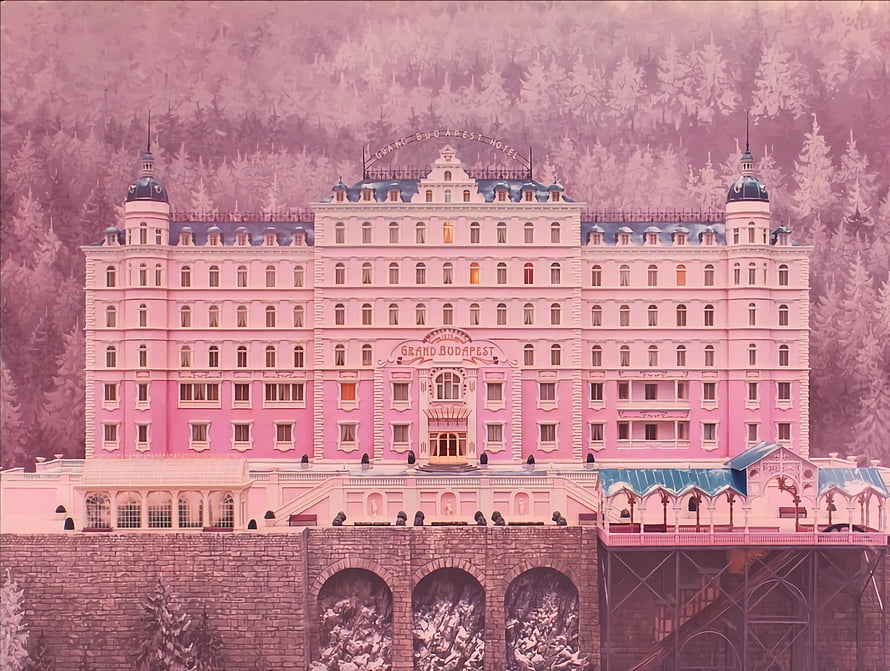 Grand Budapest Hotel Pink Facade in Snowy Mountain Landscape HD wallpaper