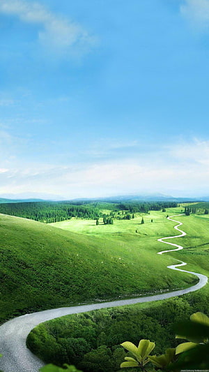 Winding River Through Lush Green Rolling Hills Under a Clear Blue Sky HD phone wallpaper