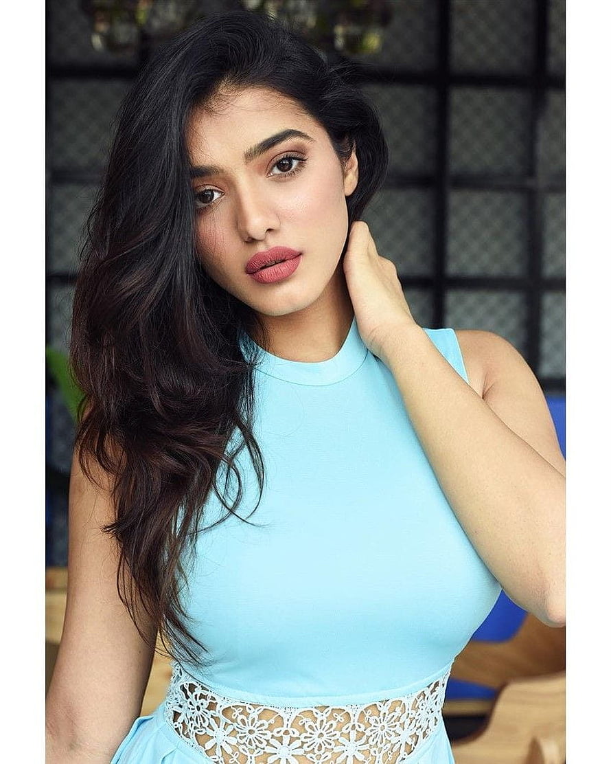 Ketika Sharma in a light blue sleeveless top with white lace waist detail HD phone wallpaper