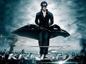 Krrish 3 Superhero Standing Over City Skyline with Dramatic Dark Clouds HD wallpaper