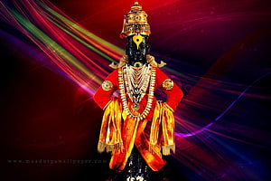 Virtually adorned Vitthal deity statue in vibrant red and gold attire against a colorful abstract background HD wallpaper
