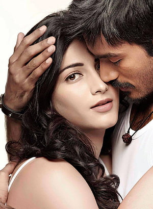Dhanush and Shruti Haasan Intimate Portrait in Romantic Embrace HD phone wallpaper