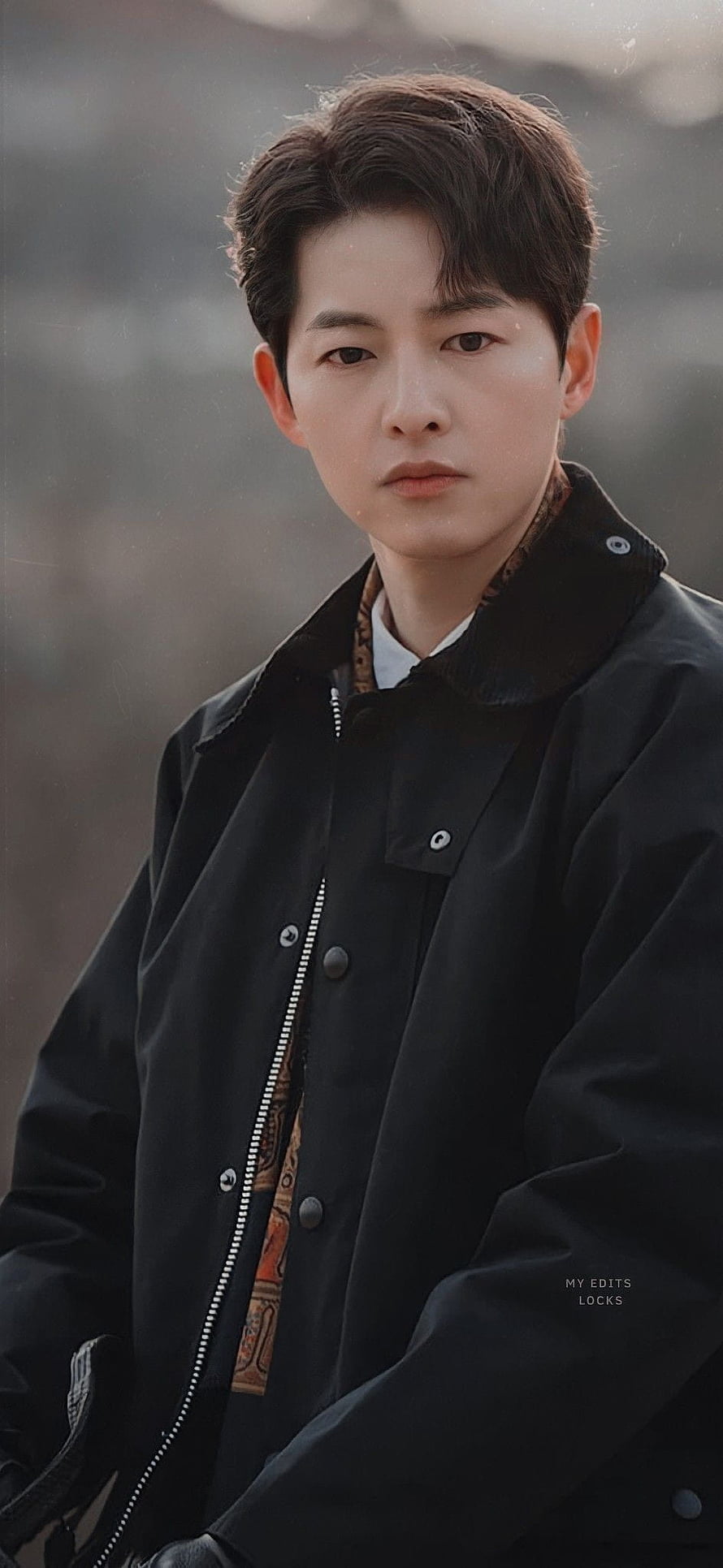 Song Joong Ki in Vincenzo Wearing a Black Jacket with a Serious Expression HD phone wallpaper