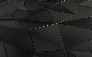 Dark Geometric Faceted Surface with Subtle Metallic Edge Highlights HD wallpaper