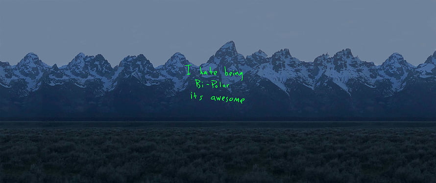 Snow-Capped Mountain Range at Dusk with Green Text Overlay HD wallpaper