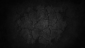 Dark Cracked Concrete Wall Texture with Deep Fractures and Grunge Surface HD wallpaper