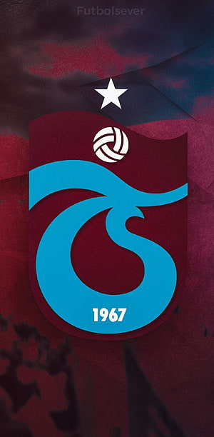 Trabzonspor 1967 Club Crest Logo on Dark Maroon Fabric Background HD phone wallpaper
