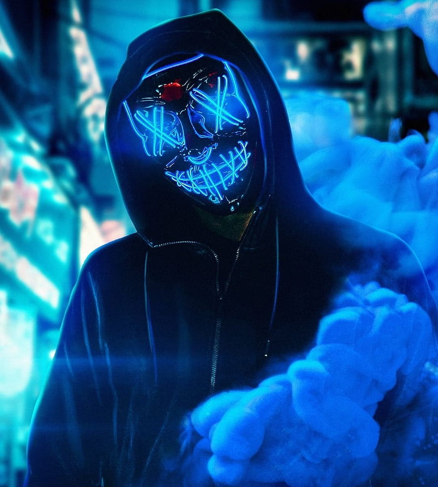 Cyberpunk Hacker in Black Hoodie with Glowing Blue Neon Mask and Smoke HD phone wallpaper