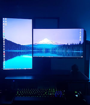 Dual Monitor Gaming Setup with Portrait and Landscape Displays Featuring Mountain Lake Wallpaper HD phone wallpaper