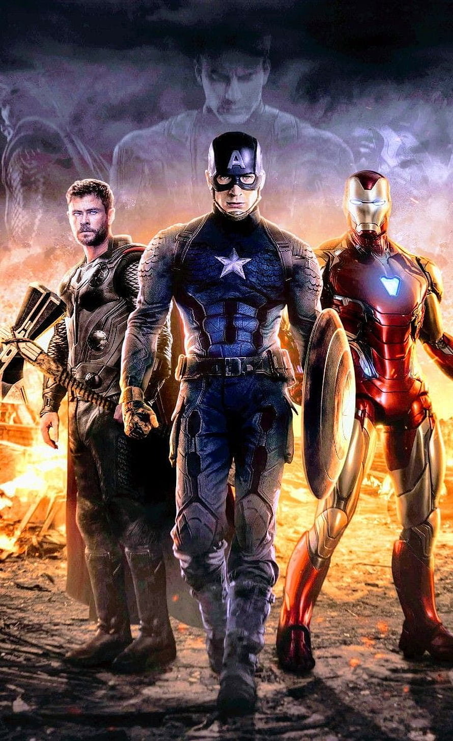 Captain America, Thor, and Iron Man Standing Together in a Dramatic Battle Scene HD phone wallpaper