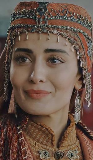 Gonca Hatun and Bala Hatun in ornate traditional Ottoman headwear and embroidered costume HD phone wallpaper