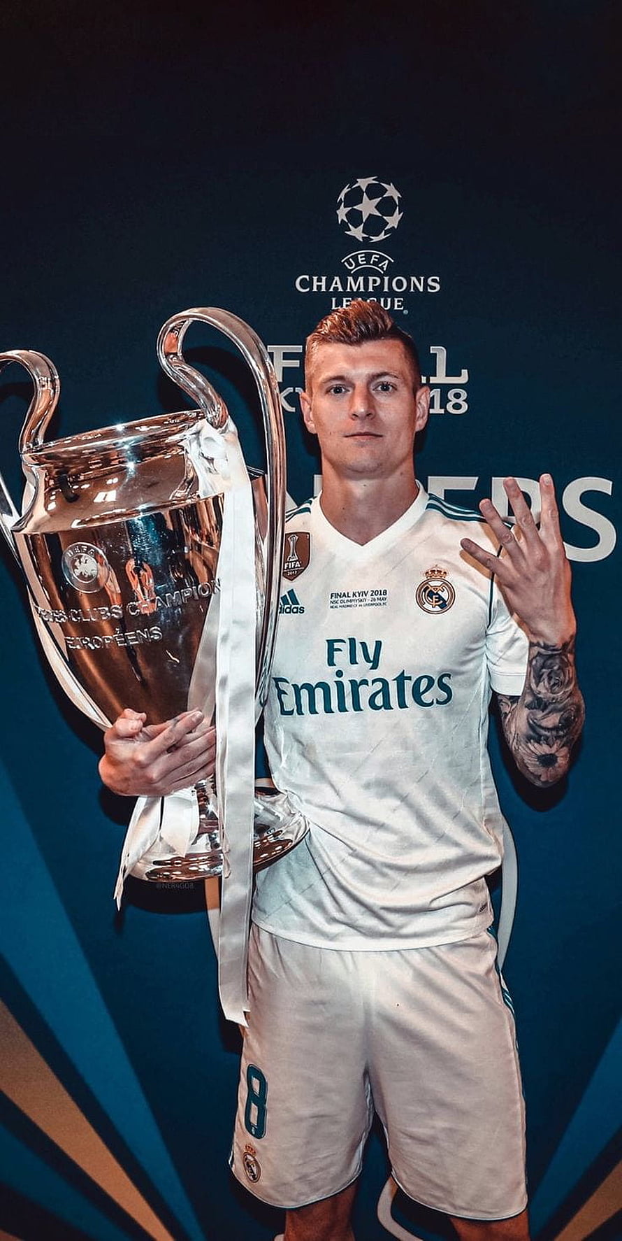 Toni Kroos Holding UEFA Champions League Trophy in Real Madrid Kit HD phone wallpaper