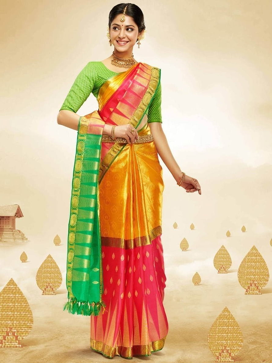 Elegant Woman in Vibrant Green and Pink Silk Saree with Gold Zari Border HD phone wallpaper