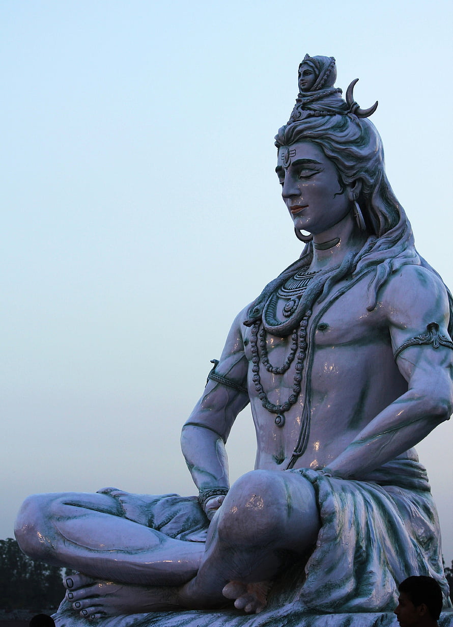 Meditating Lord Shiva Statue in Rishikesh with Serene Blue Sky HD phone wallpaper