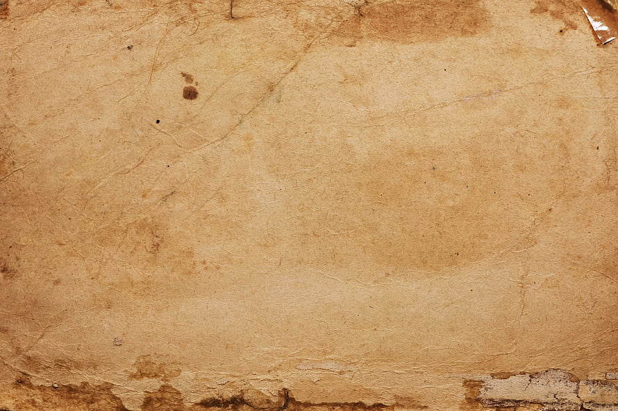 Aged Parchment Texture with Natural Stains and Cracks for Vintage Design Projects HD wallpaper