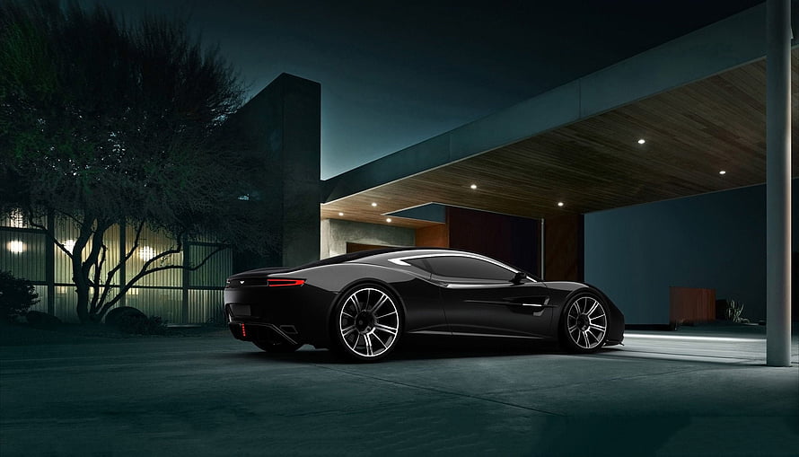 Sleek Black Aston Martin Supercar Parked at Modern Residence at Night HD wallpaper