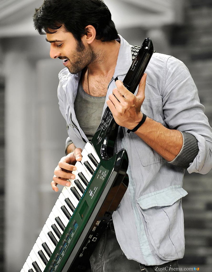 Prabhas Playing Keytar in Mirchi Movie Still HD phone wallpaper
