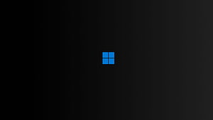 Windows 11 Minimalist Black Background with Centered Blue Logo HD wallpaper