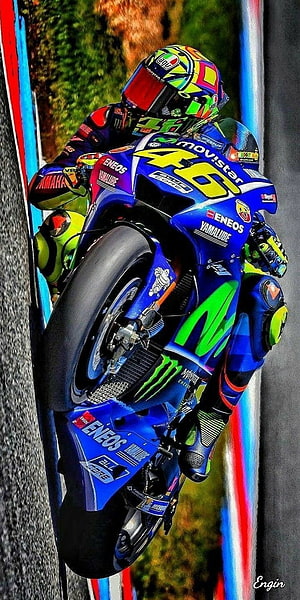 Valentino Rossi Riding Blue Yamaha YZR-M1 Motorcycle During MotoGP Race HD phone wallpaper