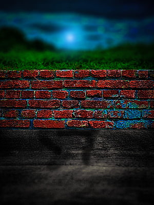 Moody Red Brick Wall With Blurred Green Field And Night Sky Background HD phone wallpaper