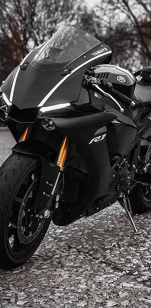 Black Yamaha R1 Superbike with Gold Forks on Cobblestone Street HD phone wallpaper