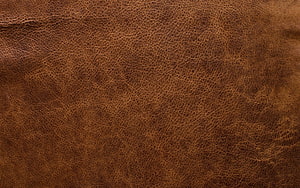 Rich Brown Leather Texture Close-Up with Natural Grain and Wrinkles HD wallpaper