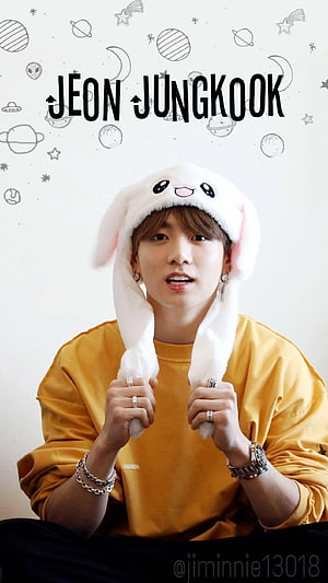 Jungkook Wearing a Cute White Bunny Hat and Yellow Sweatshirt HD phone wallpaper