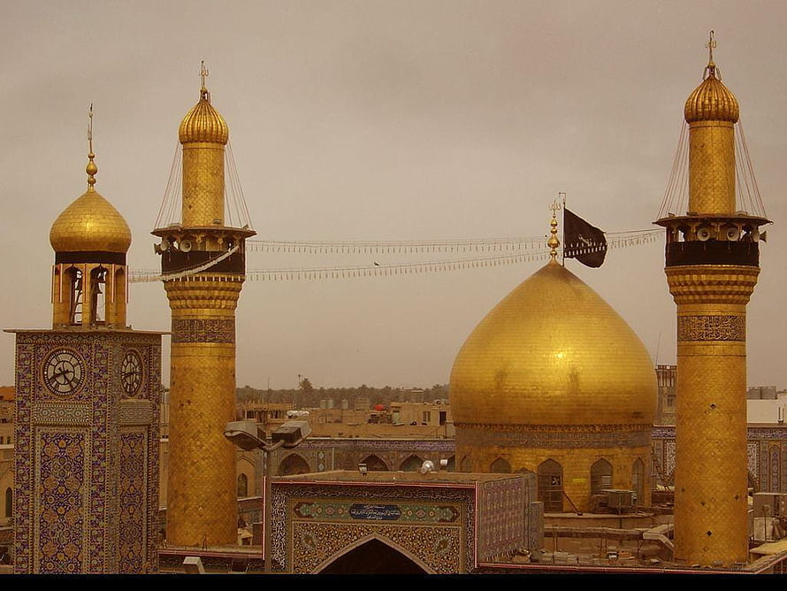Golden Dome and Minarets of the Imam Ali Shrine in Karbala, Iraq HD wallpaper