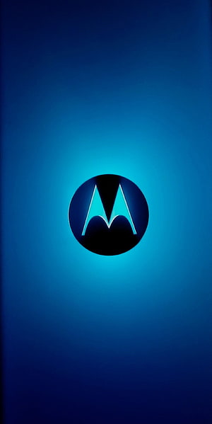 Glowing Motorola Logo on Deep Blue Gradient Background HD phone wallpaper