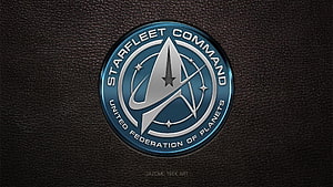 Star Trek Starfleet Command Insignia on Textured Black Surface HD wallpaper