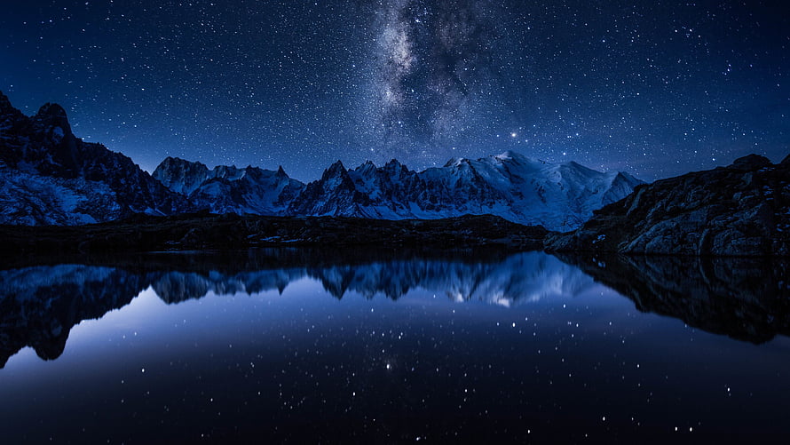 Milky Way Galaxy Reflecting in a Mountain Lake Under a Starry Night Sky HD wallpaper