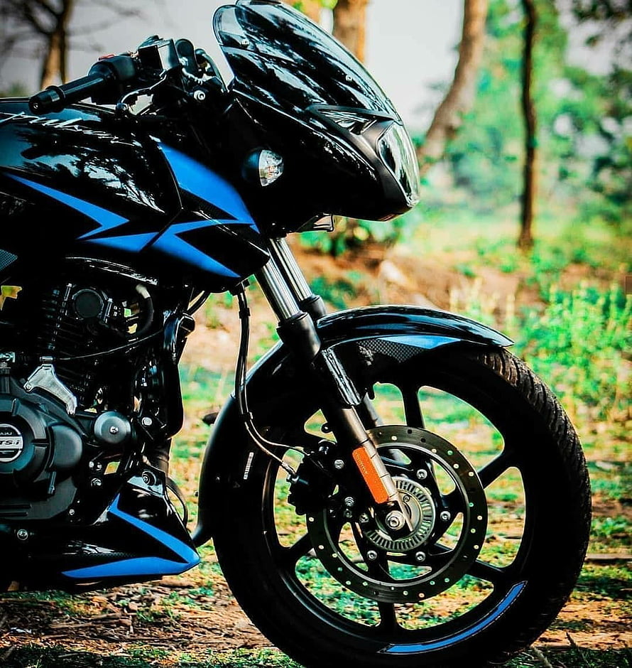 Black and Blue Bajaj Pulsar 150 Motorcycle Front View in Forest Setting HD phone wallpaper