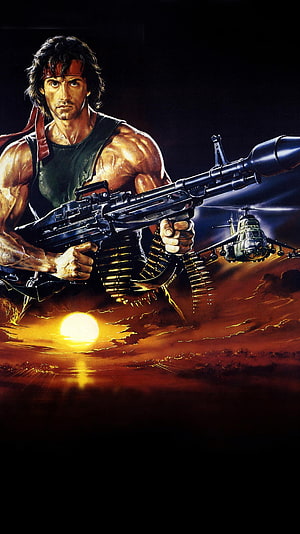 Rambo First Blood Part II Movie Poster Artwork Featuring Sylvester Stallone with Machine Gun and Helicopter at Sunset HD phone wallpaper