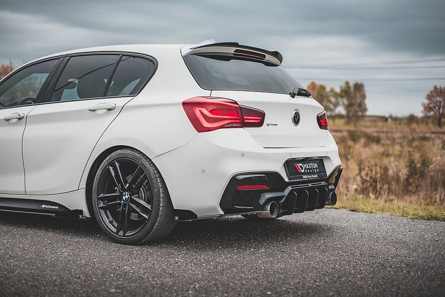 White BMW M140i Rear Three-Quarter View with Black Alloy Wheels and Sporty Diffuser HD wallpaper