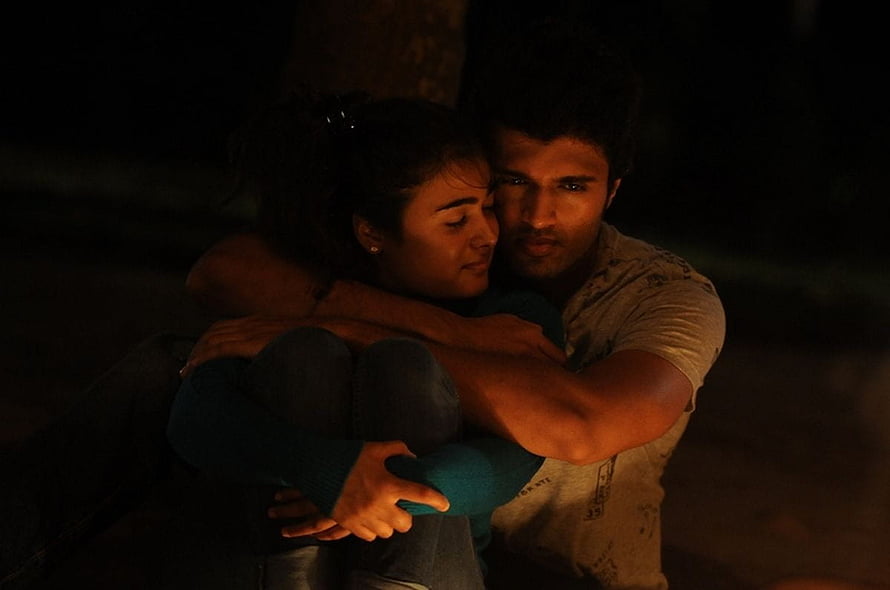Arjun Reddy Movie Still: Intimate Nighttime Embrace in Dim Warm Lighting HD wallpaper
