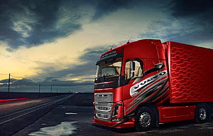 Red Volvo FH16 Globetrotter Heavy Duty Truck on Highway at Dusk HD wallpaper