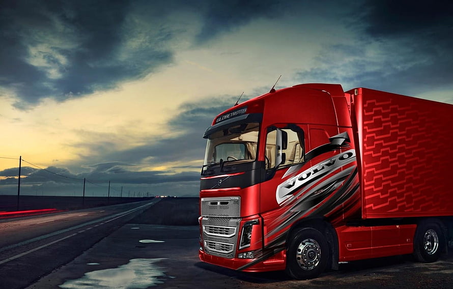 Red Volvo FH16 Globetrotter Heavy Duty Truck on Highway at Dusk HD wallpaper