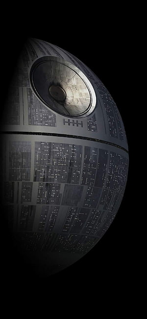 Death Star Superweapon Floating in Deep Space with Dark Metallic Surface HD phone wallpaper