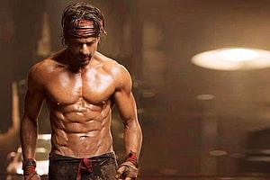 Shah Rukh Khan shirtless in Happy New Year with red headband and wrapped fists HD wallpaper