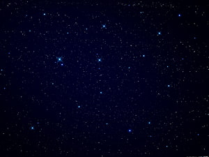 Deep Space Star Field with Bright Blue Stars Against a Dark Night Sky HD wallpaper
